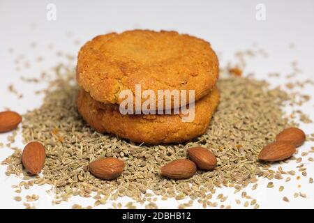 almonds (without shell) and sesame, homemade cookies, white backgrou Stock Photo