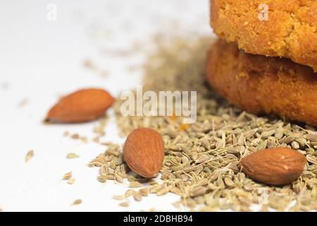 almonds (without shell) and sesame, homemade cookies, white background Stock Photo