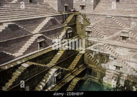 The Step Well - Toorji Ka Jhalara. Local sight. Symmetry steps. Geometry. Heritage in Jodhpur, Rajasthan, India Stock Photo