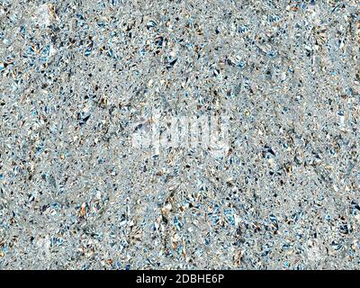 grey aluminium foil texture useful as a background, with color light reflection Stock Photo