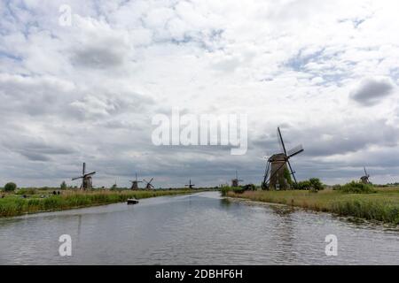 Netherlands rural lanscape with windmills at famous tourist site Kinderdijk in Holland Stock Photo