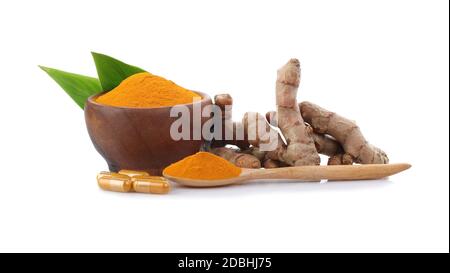 Turmeric , turmeric powder and turmeric capsules on white background Stock Photo