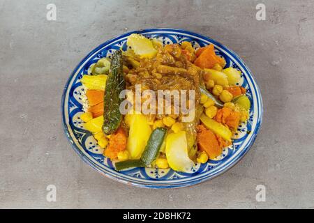 Colorful Couscous in a French Restaurant - Dish Stock Photo