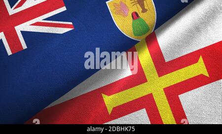 Turks and Caicos Islands and Guernsey two flags Stock Photo