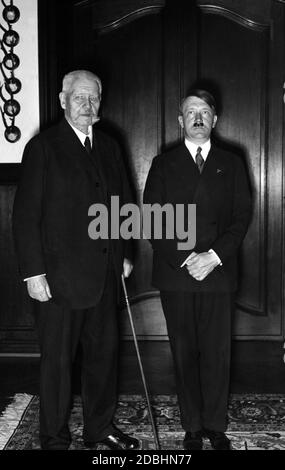 One of Paul von Hindenburg's last photographs on his estate in Neudeck (today Ogrodzieniec) in the present day Poland, together with Reich Chancellor Adolf Hitler. Stock Photo