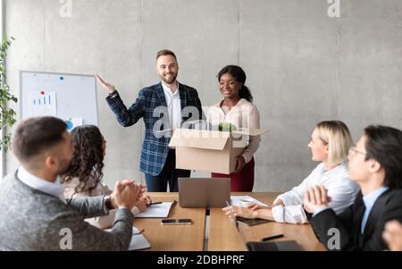 HR Manager Introducing New Female Employee To Colleagues In Office Stock Photo