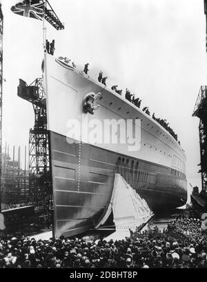 'Launching of the English warship ''Prince of Wales'' in Birkenhead, Northern England. The battleship had previously been christened by Princess Mary, the sister of King George VI.' Stock Photo