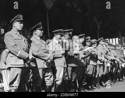 During the parade of the Hitler Youth in the Nuremberg Municipal Stadium from left: Martin Bormann, Robert Ley, Joseph Goebbels, Hermann Goering, Julius Streicher and from right Heinrich Himmler, Viktor Lutze, Konstantin Hierl and Wilhelm Frick. Stock Photo