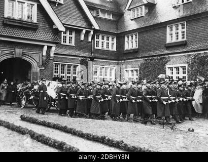 The funeral of Prince Henry of Prussia took place on April 24, 1929. He was buried in a mausoleum on his estate Hemmelmark. In the picture the coffin is pulled on the gun carriage by 32 naval officers. Behind the wagon walks the widow Irene of Prussia (born of Hesse-Darmstadt) on the left of the picture. Stock Photo