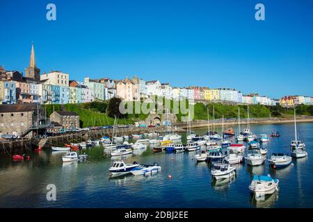 View of the town centre and fishing boats in the harbour, Tenby, Pembrokeshire, Wales, United Kingdom, Europe Stock Photo