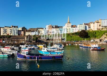 View of the town centre and fishing boats in the harbour, Tenby, Pembrokeshire, Wales, United Kingdom, Europe Stock Photo