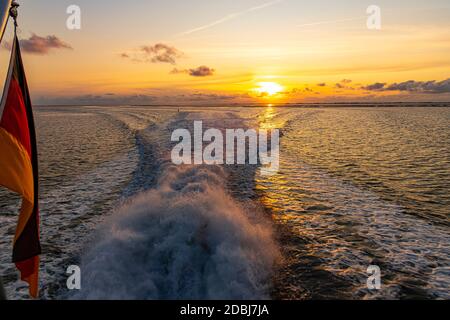 Sunset in the Wadden Sea in front of Pellworm Stock Photo