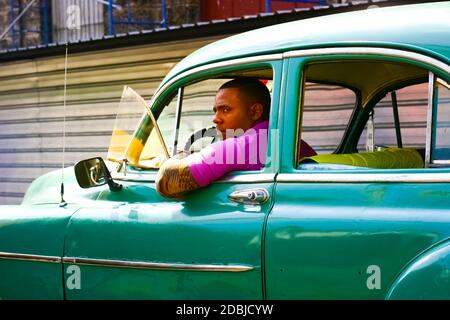 July 15, 2019 - Havana Cuba. Old retro car in Havana with taxi driver Stock Photo