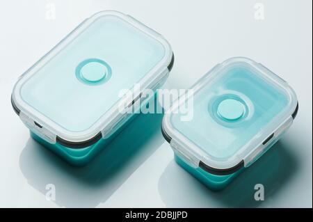 Two clean lunch boxes with cover isolated on white background Stock Photo