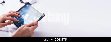 Home And Energy Automation. Mobile Heating Control Tech Stock Photo