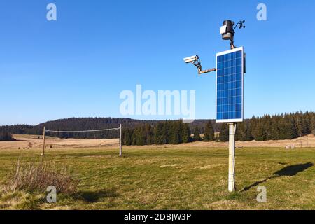 Solar powered weather station and CCTV camera in remote rural location. Stock Photo