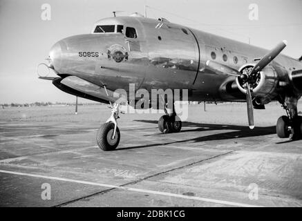 A United States Navy, USN, Douglas R5D-2, a version of the C-54 Spymaster and Douglas DC-4, at Croydon Airport in England during the 1950s. Stock Photo