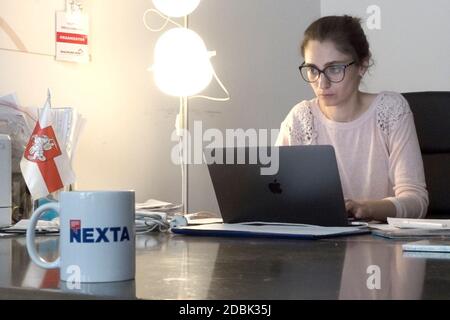 A woman is seen at work at the NEXTA office at the Belarusian House Foundation in Warsaw, Poland on August 27, 2020. Belarusian auhorities have requested the extradition of Svetlov and a second journalist, Roman Protasevich for alleged criminial activities relating to the publishing of footage and videos of anti-government demonstrations in Belarus. Mass protests have been ongoing in Belarus following the election to a 6th term of Alexander Lukashenko on August 9, 2020. Belarusians are being denied news of the protests laeving them to alternative sources like Telegram which sends encrypted fi Stock Photo