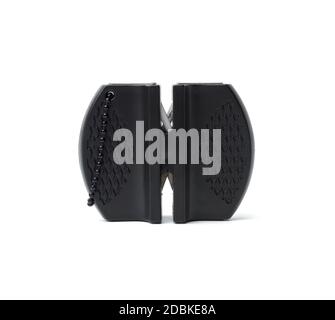 black plastic knife sharpener isolated on white background, close up Stock Photo