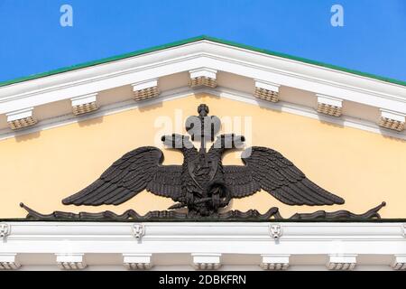 Black Two-headed eagle barelief, Russian coat of arms with a rider on board. Symbol of imperial Russia. Decoration of Saint Petersburg Mining Universi Stock Photo