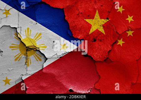 flags of Philippines and China painted on cracked wall Stock Photo - Alamy