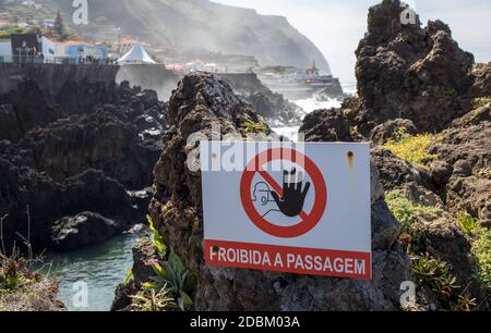 Porto Moniz, Madeira, Portugal - April 18, 2018: Natural rock pool of Porto Moniz on Madeira Island. Portugal.  It is a public bath with water from th Stock Photo