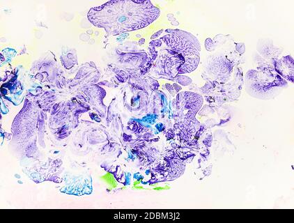 minimalist art - abstract spots handcrafted by typing violet and blue pigments on paper from aqueous surface in Ebru (paper marbling) technique Stock Photo