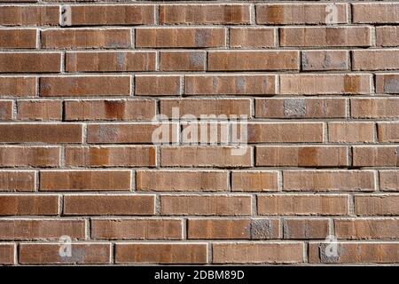 Background from a wall made of brown bricks Stock Photo