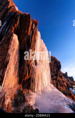 Frozen waterfall on the Miner's Track, Snowdon mountain, North Wales Stock Photo