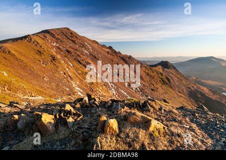 Crib Goch with snow from the summit of Snowdon, North Wales Stock Photo