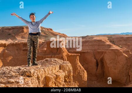 Hiker at Flaming Cliffs, Mongolia Stock Photo