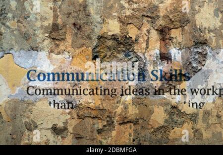 Communication skills text on wall Stock Photo