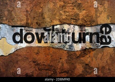 Downturn text on wall Stock Photo