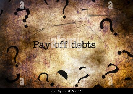 Pay off debts grunge concept Stock Photo