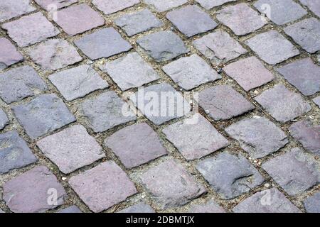 Very old pavement made from cobble stone Stock Photo