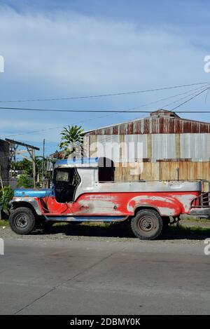 plain and undecorated jeepney in the Philippines Stock Photo - Alamy