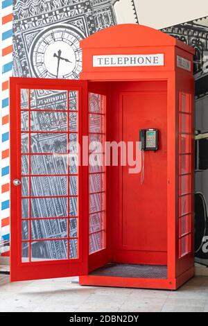 Open Door at Red Telephone Box Not Original Stock Photo