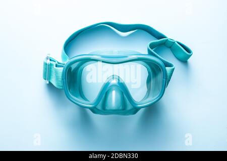 Blue diving mask on blue background. Top view. Stock Photo