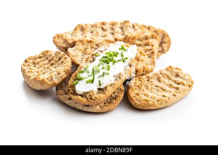 Crispbread with creamy cheese and green chive. isolated on white background. Stock Photo