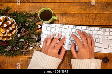 A Xmas touch on a smart working desk. Even a computer desk can get a merry makeover with some joyful details. Stock Photo