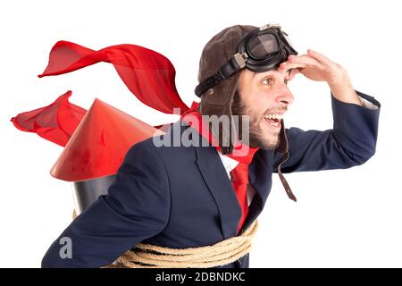 Businessman with homemade rocket and googles ready for a challenge Stock Photo