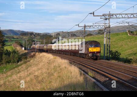 West Coast railways class 47 locomotive 47804 hauling the Northern belle luxury dining train on the west coast mainline in Cumbria Stock Photo