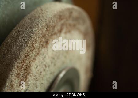 Old rusty Grindstone grinder in the workshop Stock Photo