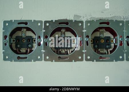 Disassembled power socket. Installation of the power socket Stock Photo