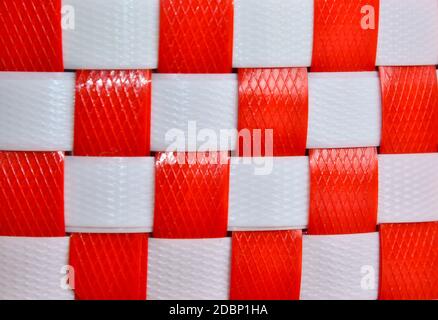Dark Red and White Checkers textured plastic rope background Stock Photo