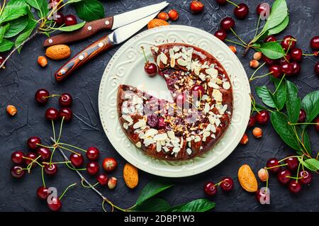 American homemade cherry pie on the table.Summer galette with cherries Stock Photo