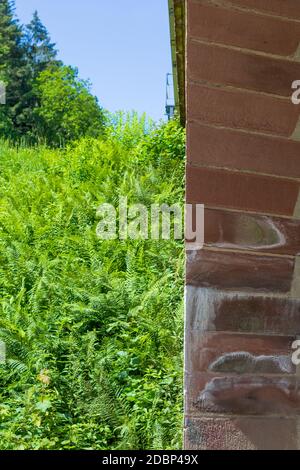 sandstone facade of a railway tunnel Stock Photo