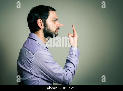 man with the big nose, lie concept Stock Photo