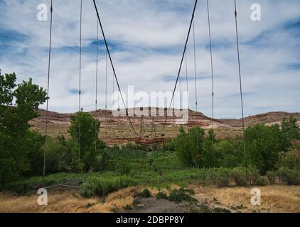 The remains from the old suspension bridge over the Colorado River near Dewey Stock Photo