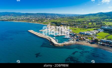 Aerial bird's eye view of Latchi port, Akamas peninsula, Polis Chrysochous, Paphos, Cyprus. The Latsi harbour with boats and yachts, fish restaurants, Stock Photo